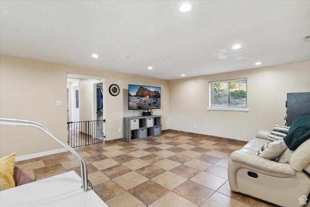 1260 E 2925 N, North Ogden, UT 84414 - living room featuring baseboards and recessed lighting
