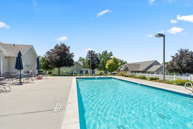 3304 S Hunter Villa Ln Unit D, West Valley City, UT 84128 - community pool featuring a patio area