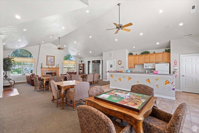 3304 S Hunter Villa Ln Unit D, West Valley City, UT 84128 - dining room with a ceiling fan, recessed lighting, high vaulted ceiling, and a fireplace