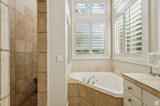 1652 E Red Tree Ct S, Draper, UT 84020 - bathroom with healthy amount of natural light, a jetted tub, vanity, and a tile shower