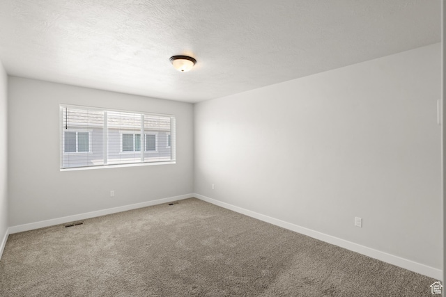 15040 S Wild Horse Way, Bluffdale, UT 84065 - carpeted spare room with baseboards and a textured ceiling