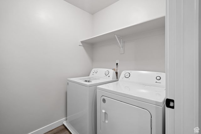 15040 S Wild Horse Way, Bluffdale, UT 84065 - laundry room with separate washer and dryer and wood finished floors