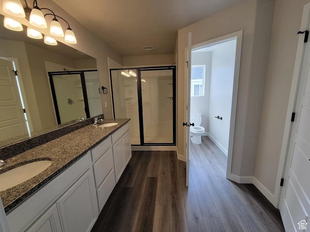15040 S Wild Horse Way, Bluffdale, UT 84065 - full bathroom with a shower stall, wood finished floors, and double vanity