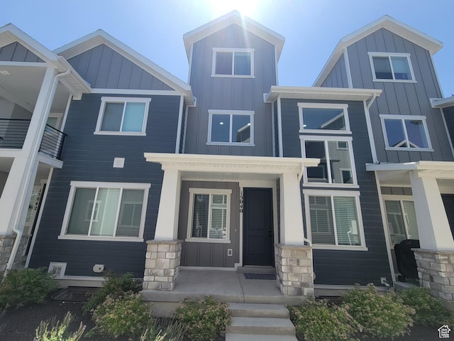 15040 S Wild Horse Way, Bluffdale, UT 84065 - view of front of house featuring board and batten siding and stone siding