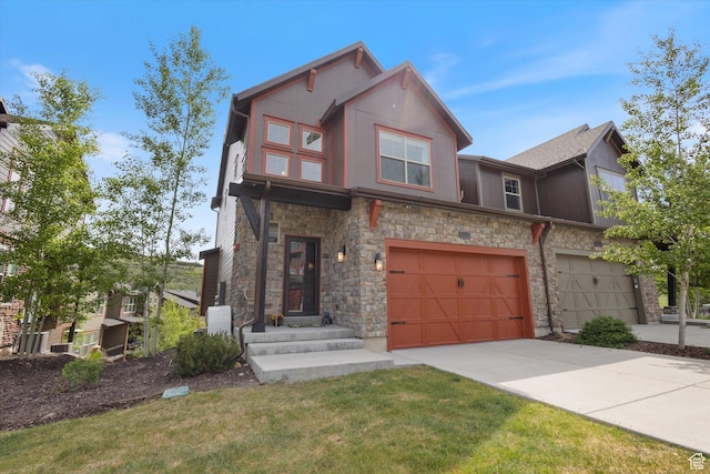 1076 W Abigail Dr, Kamas, UT 84036 - view of front of house featuring stone siding, driveway, an attached garage, and a front yard