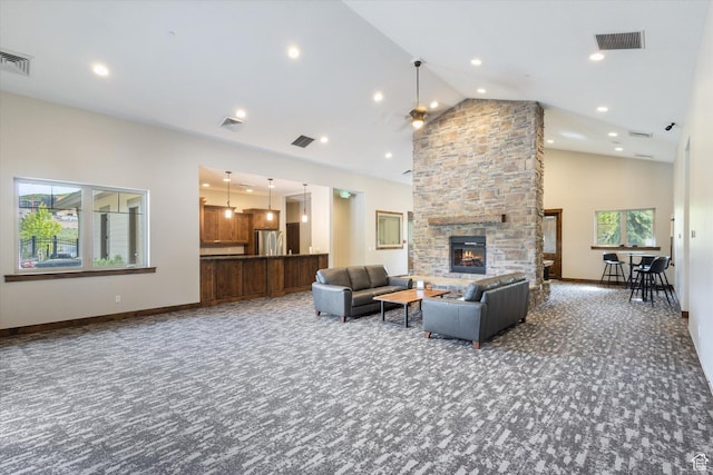 1076 W Abigail Dr, Kamas, UT 84036 - carpeted living room with high vaulted ceiling, a stone fireplace, and recessed lighting