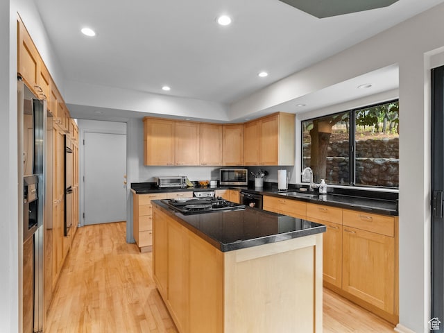 2842 E Oakbrook Cir, Salt Lake City, UT 84108 - kitchen with cooktop, dishwasher, light wood-style flooring, light brown cabinets, and recessed lighting