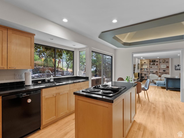 2842 E Oakbrook Cir, Salt Lake City, UT 84108 - kitchen with black appliances, dark countertops, light brown cabinetry, light wood finished floors, and recessed lighting