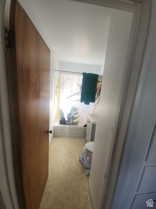 1105 9th St, Ogden, UT 84404 - hall with light carpet and arched walkways