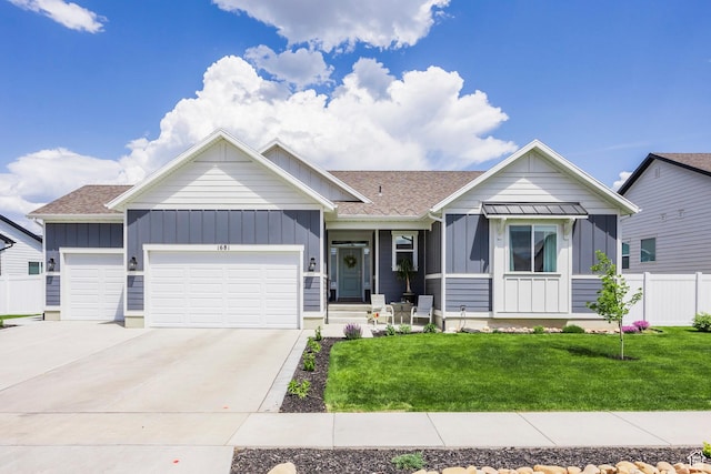 1681 S 1110 E, Heber City, UT 84032 - view of front of house featuring board and batten siding, an attached garage, driveway, and a shingled roof