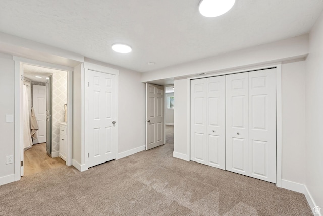 2104 W Champagne Cir, Taylorsville, UT 84129 - unfurnished bedroom featuring carpet and a closet