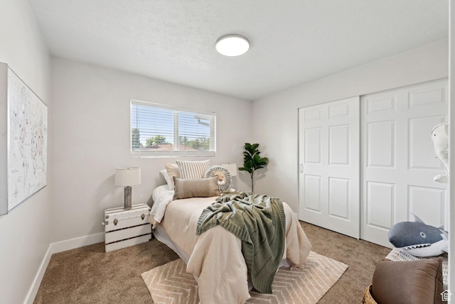 2104 W Champagne Cir, Taylorsville, UT 84129 - bedroom featuring light colored carpet and a closet