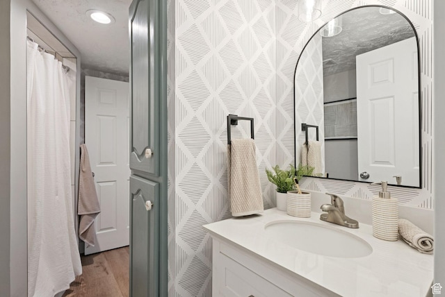 2104 W Champagne Cir, Taylorsville, UT 84129 - bathroom with vanity and wood finished floors