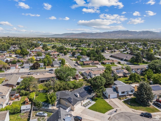 2104 W Champagne Cir, Taylorsville, UT 84129 - aerial view of residential area with a mountain backdrop