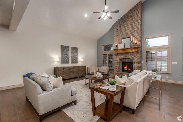 10677 S Amberley Ln E, Sandy, UT 84094 - living area featuring high vaulted ceiling, ceiling fan, wood finished floors, and a brick fireplace