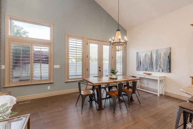 10677 S Amberley Ln E, Sandy, UT 84094 - dining space with high vaulted ceiling, a chandelier, dark wood-style floors, plenty of natural light, and french doors