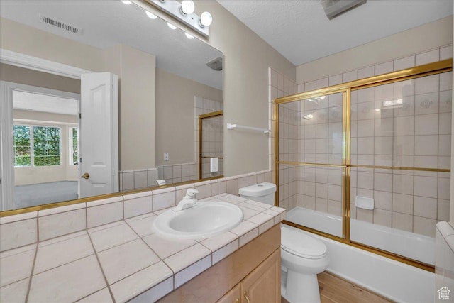 1912 W Rivers Edge Ln, St George, UT 84770 - full bath with vanity, wood finished floors, and combined bath / shower with glass door