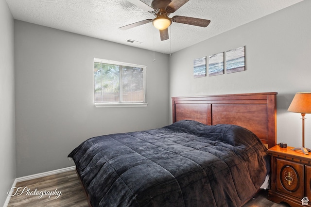 1161 S 860 W, Cedar City, UT 84720 - bedroom featuring dark wood finished floors, a textured ceiling, and a ceiling fan