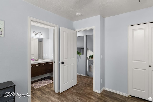 1161 S 860 W, Cedar City, UT 84720 - bedroom with dark wood-style flooring, a closet, and connected bathroom