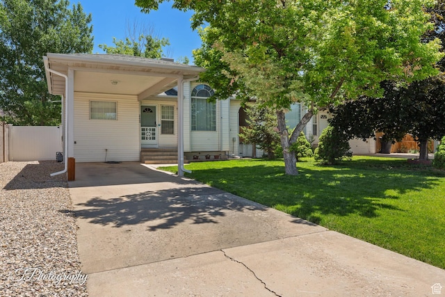 1161 S 860 W, Cedar City, UT 84720 - view of front of house with driveway, entry steps, and a carport