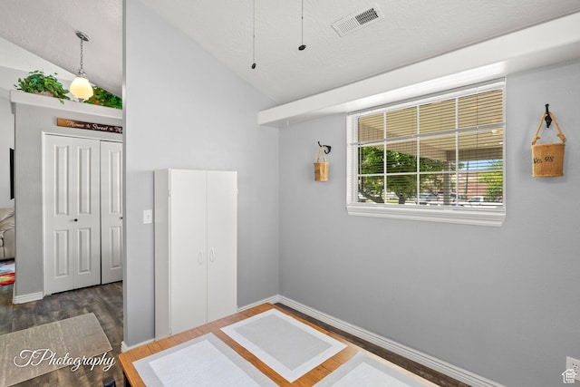 1161 S 860 W, Cedar City, UT 84720 - empty room featuring wood finished floors, lofted ceiling, and a textured ceiling