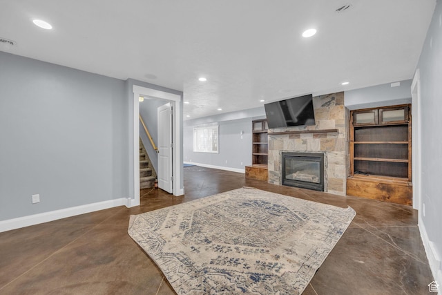 2352 N 1160 W, Clinton, UT 84015 - living room with finished concrete floors, stairs, a large fireplace, and recessed lighting