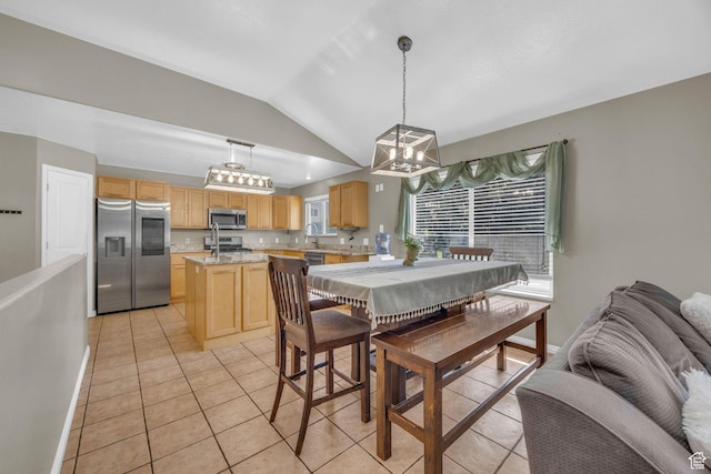 2352 N 1160 W, Clinton, UT 84015 - dining area with vaulted ceiling, light tile patterned floors, and a chandelier