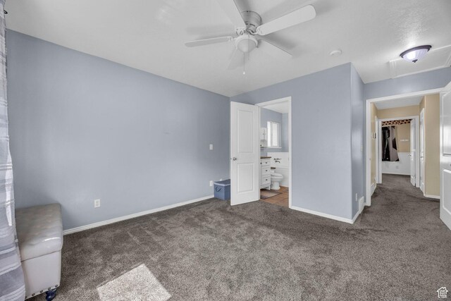 2352 N 1160 W, Clinton, UT 84015 - unfurnished bedroom featuring carpet flooring, ensuite bath, and a ceiling fan