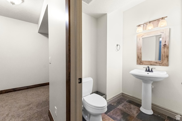 1254 W 475 S, Farmington, UT 84025 - bathroom with a textured ceiling and stone finish floors