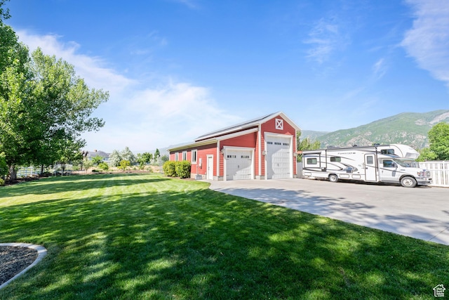 1254 W 475 S, Farmington, UT 84025 - view of grassy yard with a mountain view, an outbuilding, and a detached garage