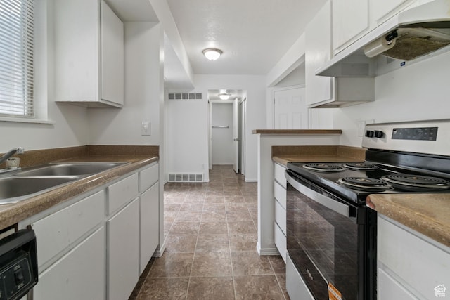 814 E Meadow Pine Ct, Salt Lake City, UT 84106 - kitchen featuring electric range, under cabinet range hood, and white cabinets