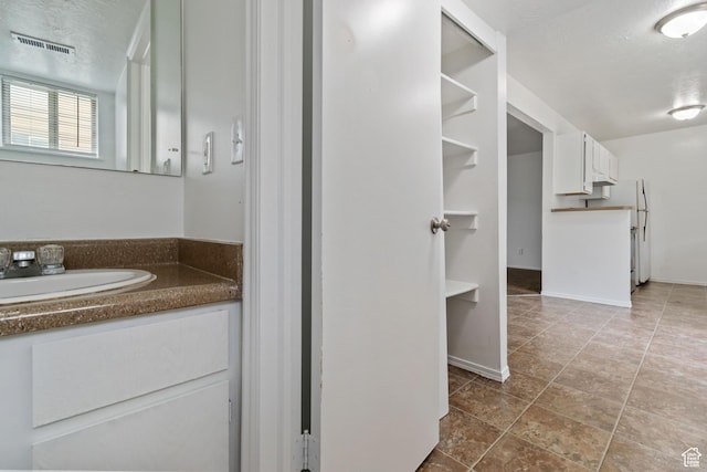 814 E Meadow Pine Ct, Salt Lake City, UT 84106 - bathroom featuring vanity and baseboards
