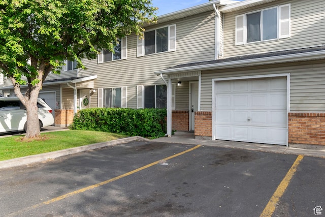 814 E Meadow Pine Ct, Salt Lake City, UT 84106 - multi unit property featuring brick siding and uncovered parking