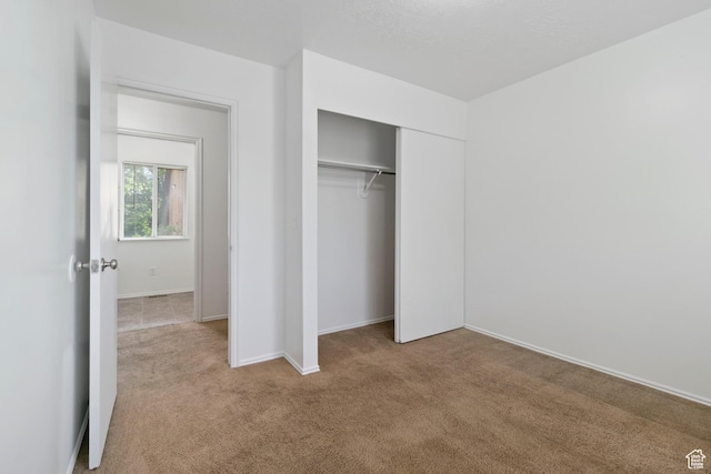 814 E Meadow Pine Ct, Salt Lake City, UT 84106 - unfurnished bedroom with carpet floors and a closet