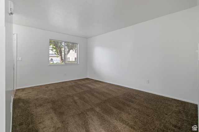 814 E Meadow Pine Ct, Salt Lake City, UT 84106 - unfurnished room featuring dark colored carpet and baseboards
