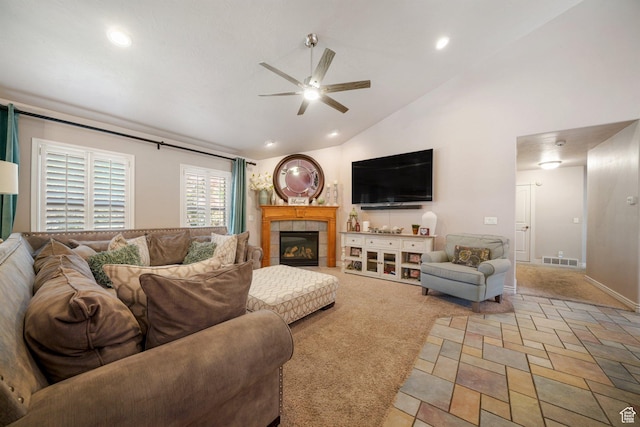 3116 W Hayden Ridge Way, Riverton, UT 84065 - carpeted living area featuring a ceiling fan, lofted ceiling, a fireplace, and recessed lighting