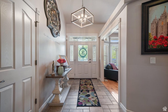 3116 W Hayden Ridge Way, Riverton, UT 84065 - entrance foyer featuring a chandelier and baseboards