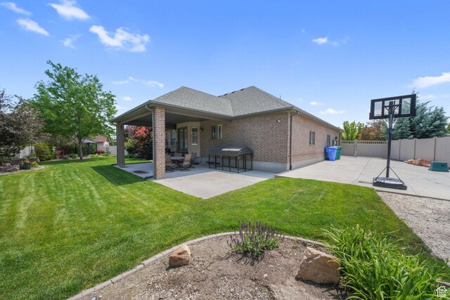3116 W Hayden Ridge Way, Riverton, UT 84065 - rear view of property featuring a patio and brick siding