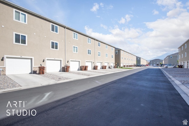 43 E 670 N, Vineyard, UT 84059 - view of asphalt road with a residential view