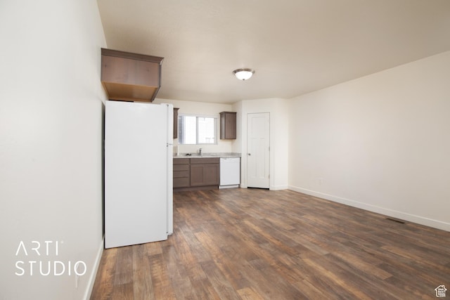 43 E 670 N, Vineyard, UT 84059 - kitchen with white appliances, dark wood-style floors, and light countertops