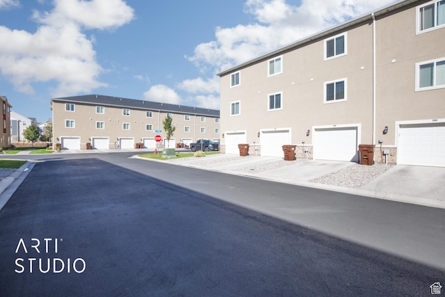 43 E 670 N, Vineyard, UT 84059 - view of asphalt street featuring traffic signs