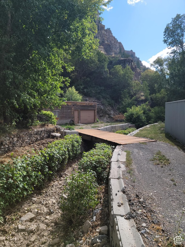 97 Main St, Ophir, UT 84071 - view of yard featuring a garage