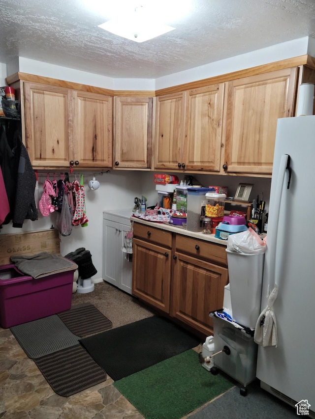 97 Main St, Ophir, UT 84071 - kitchen featuring freestanding refrigerator, light countertops, and a textured ceiling