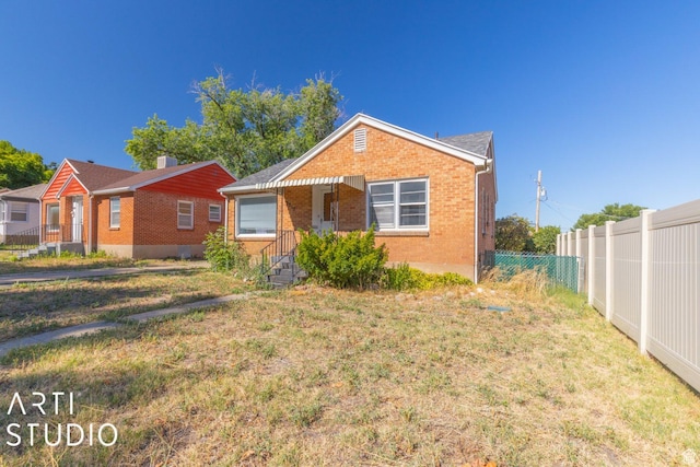 3317 Jackson Ave, Ogden, UT 84403 - bungalow-style home featuring brick siding