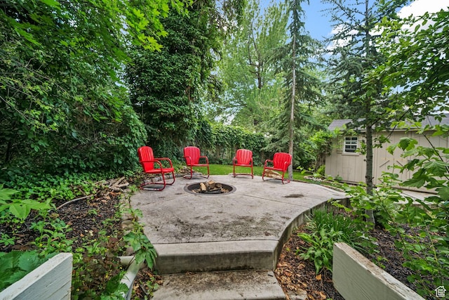 578 S 750 E, Bountiful, UT 84010 - view of patio / terrace with a fire pit and a storage unit