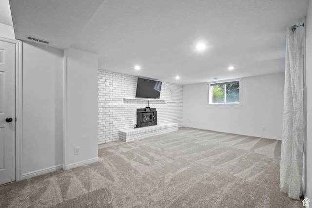 578 S 750 E, Bountiful, UT 84010 - below grade area with carpet flooring, a wood stove, and recessed lighting