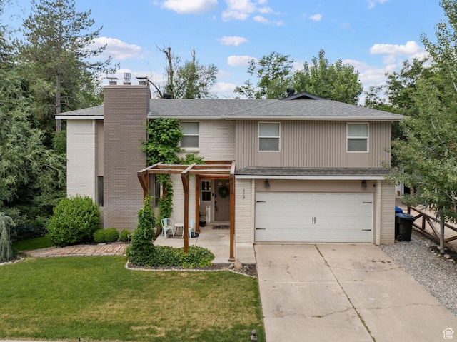 578 S 750 E, Bountiful, UT 84010 - view of front of home featuring brick siding, a garage, a front lawn, driveway, and a chimney