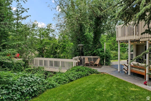 578 S 750 E, Bountiful, UT 84010 - view of grassy yard with a wooden deck and an outdoor hangout area