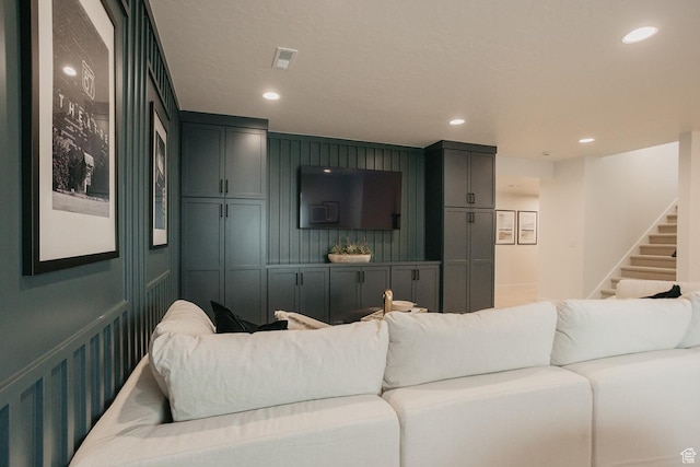 3488 E 1120 S Unit 115, Spanish Fork, UT 84660 - living area with a decorative wall, stairway, and recessed lighting