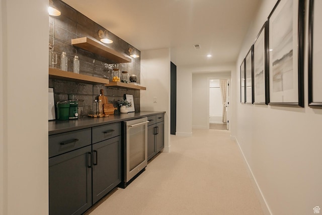 3488 E 1120 S Unit 115, Spanish Fork, UT 84660 - indoor dry bar with beverage cooler, light colored carpet, recessed lighting, and backsplash